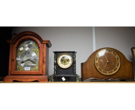 A Victorian belge noir and green marble flat top mantel clock, open skeleton movement, white enamelled outer ring, bold Roman