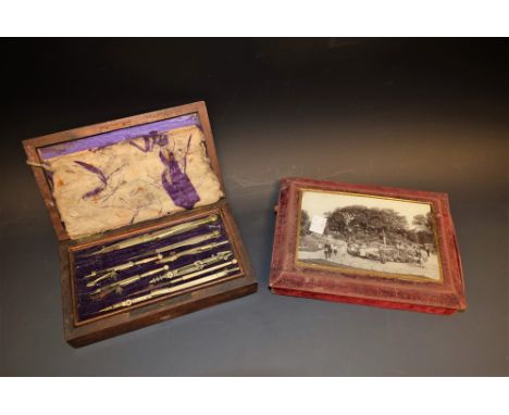 Architects drawing instruments in mahogany box, eight steel and ivory instruments in top tray, four wooden shaped aids beneat