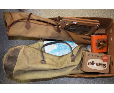 A canvas and leather tennis bag; badminton racquets (4); a Slazenger tennis ball box, 1952; another Dunlop; etc