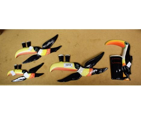Guinness Advertising - a Carltonware Toucan wall plaque; a set of three graduated flying toucans (one a/f)