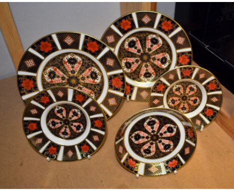 A pair of Royal Crown Derby 1128 side plates, 16cm; another pair, saucers, 11.5cm; a circular trinket dish (5)