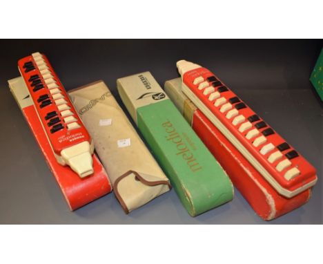 Four Hohner melodicas, three boxed, instructions; a Casio VL-Tone keyboard in original pouch