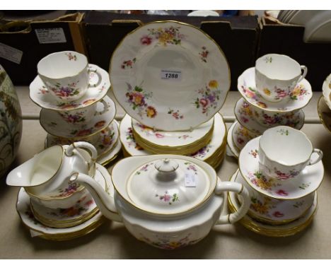 A Royal Crown Derby Posies tea service for eight including teapot, cream jug, sugar bowl, salad plates, side plates, bowls, c