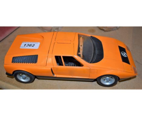 Schuco Toys - a battery operated plastic large scale Mercedes sports car, 5508, C111 - orange body,gull wing doors, black int