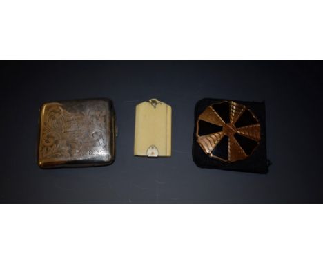 A Victorian aide memoire; a Stratton compact; a cigarette case (3)