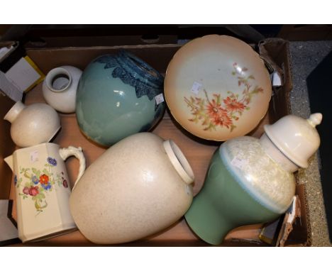 Ceramics - a Poole cream baluster vase, printed mark; two others similar; a Portmeirion Starfire lidded vase; a blush ivory c