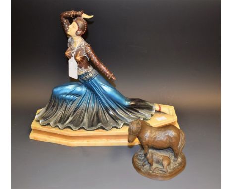 A large Art Deco figure, a/f; a horse and foal group (2)