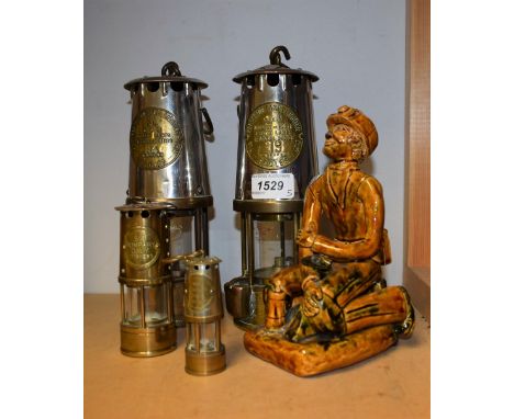 Mining Interest - an Eccles miner's lamp; another; others, smaller; a mottled figure, of a miner (5)