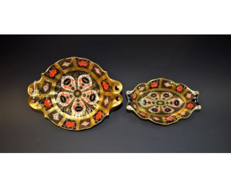 A Royal Crown Derby 1128 twin handled footed dish, first quality; another, shaped trinket dish (2)