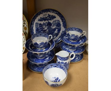 A Royal Worcester willow pattern tea service for six, inc bread plate, cups, saucers, etc