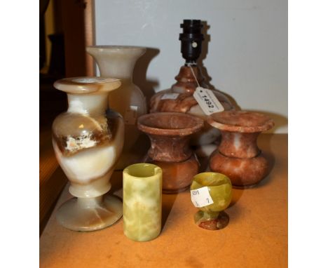 An alabaster table lamp; an alabaster turned vase; others, similar (7)