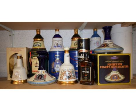 Spirits - Wade Bells whiskey decanters with contents (4); another Pusser's Rum with contents; Glenfiddich scotch whiskey; etc