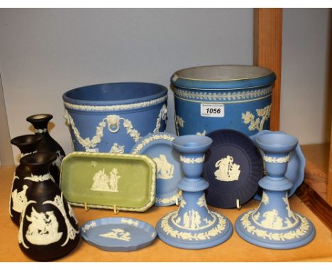 A pair of Wedgwood blue and white Jasperware candlesticks; others, planters, trinket dishes, black and white vases, etc