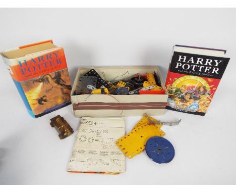 A quantity of vintage Meccano and two hardback Harry Potter first editions. [3]