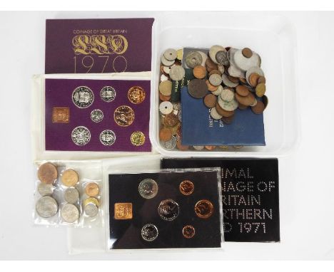A mixed lot of UK and foreign coins including two Royal Mint proof sets comprising 1970 (pre-decimal) and 1971 (first decimal
