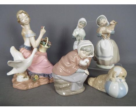 Five Spanish porcelain figurines to include Nao, Rosal and similar, largest approximately 26.5 cm (h). [5]