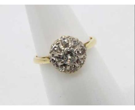 An 18ct yellow gold diamond cluster ring, size K, centre stone approximately 30 pts surrounded by eight 8 cuts, approximately