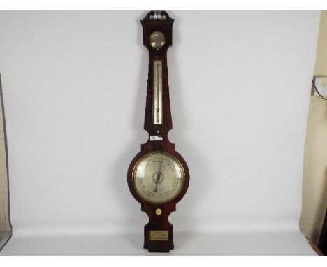 A 19th century mahogany-cased mercury banjo barometer, hygrometer and mercury thermometer, silvered engraved dial, cast brass