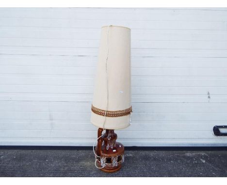 A vintage Skandesco ceramic lamp base with tall shade, approximately 125 cm (h)