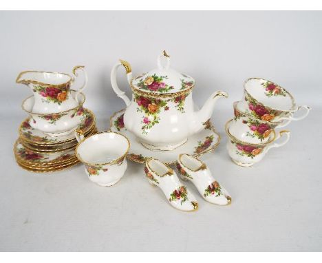 Royal Albert - Old Country Roses tea set comprising teapot, four trios, sugar bowl, milk jug and cake / sandwich plate.