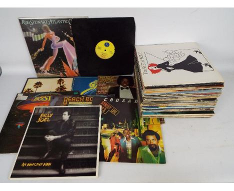 12" vinyl record collection to include Rod Stewart, Madonna, Michael Jackson, The Eagles, Boston, The Beach Boys and similar.