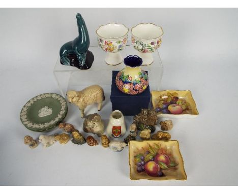 Lot to include Wedgwood, Royal Doulton, Poole Pottery, Wade and similar.