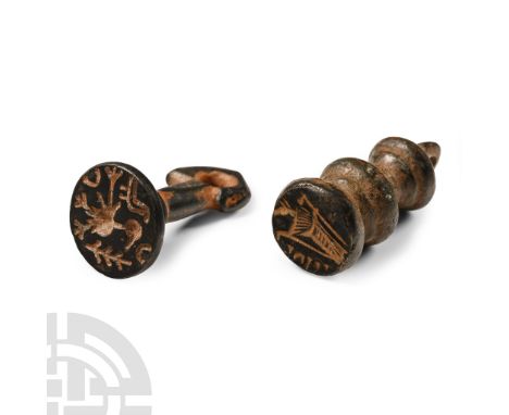 1st-14th century A,D. Comprising two seal matrices: one with a slender looped shank, intaglio design of a standing stylised b