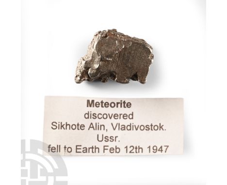 Fell 12th February 1947 A.D. A coarse octahedrite class IIB iron meteorite from a witnessed fall in the former USSR, showing 