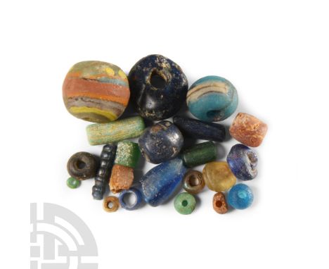 6th-8th century A.D. Including seed beads, annular, oblate, tear-shaped and other types.  17.2 grams total, 3-16 mm (1/8 - 5/