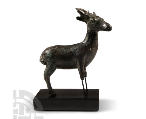 19th century A.D. Modelled standing with head slightly turned, with long ears and small antlers; tail curled against the rump