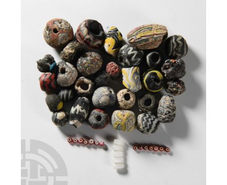 1st century A.D. and later. Including fusiform, oblate, tubular, mosaic and other types  60 grams total, 2-22 mm (1/8 - 7/8 i