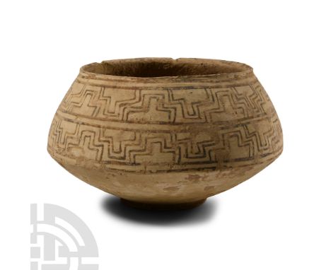 3rd-2nd millennium B.C. Biconvex in profile with slightly stepped rim, basal ring; to the shoulder, a dense pattern of interl