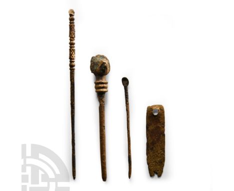 Circa 1st century A.D. Comprising: applicator with head finial; tag with nail cleaner; hair pin with balustered shank; cosmet
