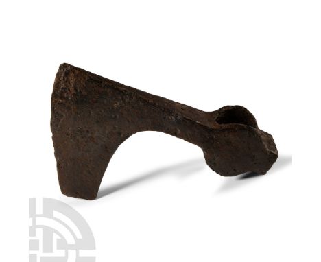 9th century A.D. With triangular section narrow blade widening to a broad bevelled edge with square chin, lateral flanges to 