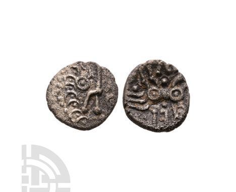 Mid 1st century B.C.-mid 1st century A.D. Obv: crude head right, pellet in ring for eye, pellets in arcs behind, stalk lips. 