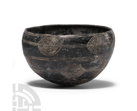 Early III- Middle Bronze Age I, 2100-1850 B.C. Hemispherical profile with three concentric bands to the outer face of vesica-