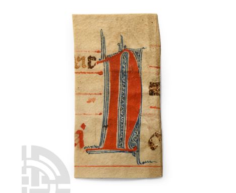 Italy, 15th century A.D. Vellum manuscript (psalter) section with versal 'N' in red with blue inked foliage and scrolls surro