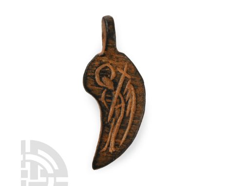 6th-7th century A.D. Claw-shaped with cross and angel motif to the obverse; an inscription reading '+O KAT...Y' to the revers