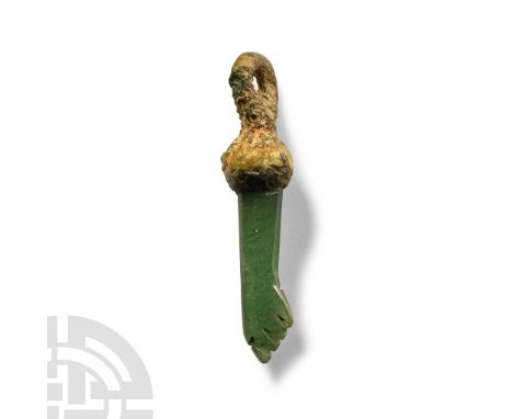 1st-2nd century A.D. An amuletic arm with hand in the fica gesture, bulb and loop above. Cf. Andrews, C., Amulets of Ancient 