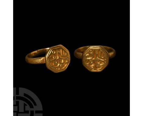14th-15th century A.D. Comprising a D-section hoop with traces of engraved guilloche to the outer edge, knop to the underside