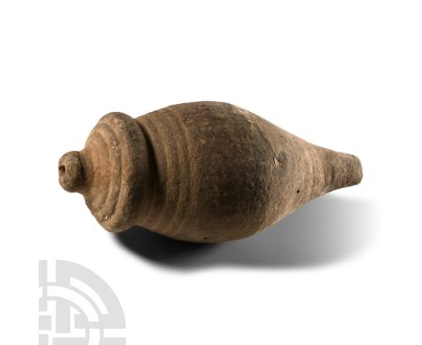 14th century A.D. Piriform body with horizontal bands to the shoulder, flanged collar, domed filler-hole, intended to be fill