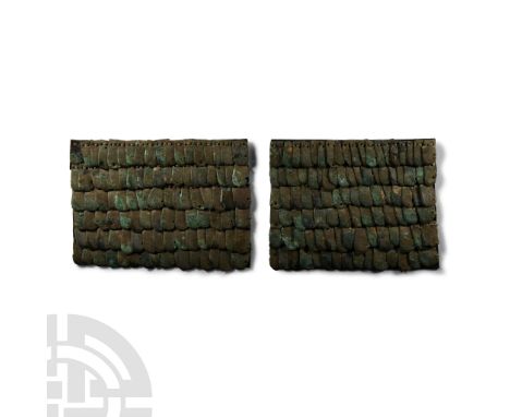 6th-5th century B.C. Two panels from a scale armour coat composed of more than two hundred overlapping bronze scales, each mo