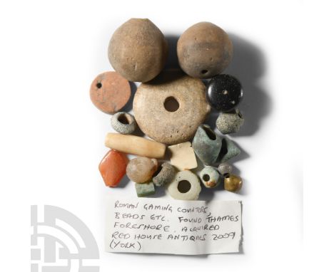 1st-4th century A.D. and later. Including a pierced biconvex counter, black glass spinner, tubular bone bead, terracotta coun