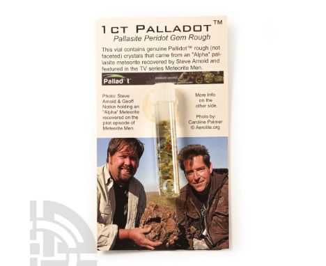Found circa 2010 A.D. Palladite peridot gem rough crystals in a glass phial.  3.91 grams total, 86 x 49 mm including card (3 