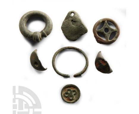 1st century B.C.-1st century A.D. Including a terret mount, penannular brooch. enamelled ring fragments, votive axehead and o