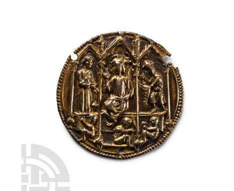 Southern Germany, circa 1300 A.D. Discoid with beaded border, repoussé scene with lancet-arch arcade, nimbate Christ seated o