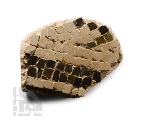 North Africa, 2nd century A.D. Portion of original matrix with inset tesserae, parallel lines and arches; old inked inscripti