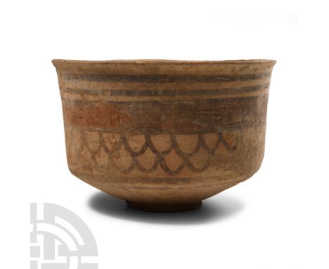 3rd-2nd millennium B.C. Bell-shaped in profile with painted horizontal bands, scale pattern below.  290 grams, 12 cm (4 3/4 i