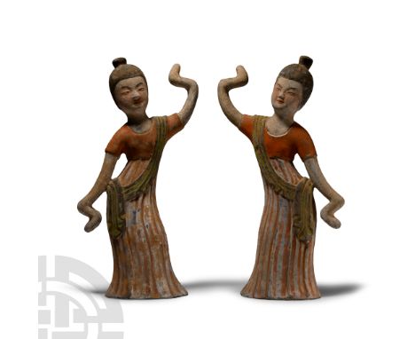 Tang Dynasty, 618-907 A.D. or later. Each in vigorous pose with sash draped from one shoulders, one arm raised and the other 