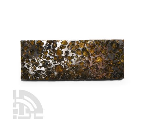 Found June 1967 A.D. A highly polished rectangular slice of the Seymchan meteorite with an exceptional number of transparent 